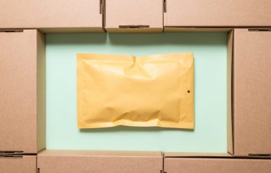 Lot of brown cardboard boxes with envelope